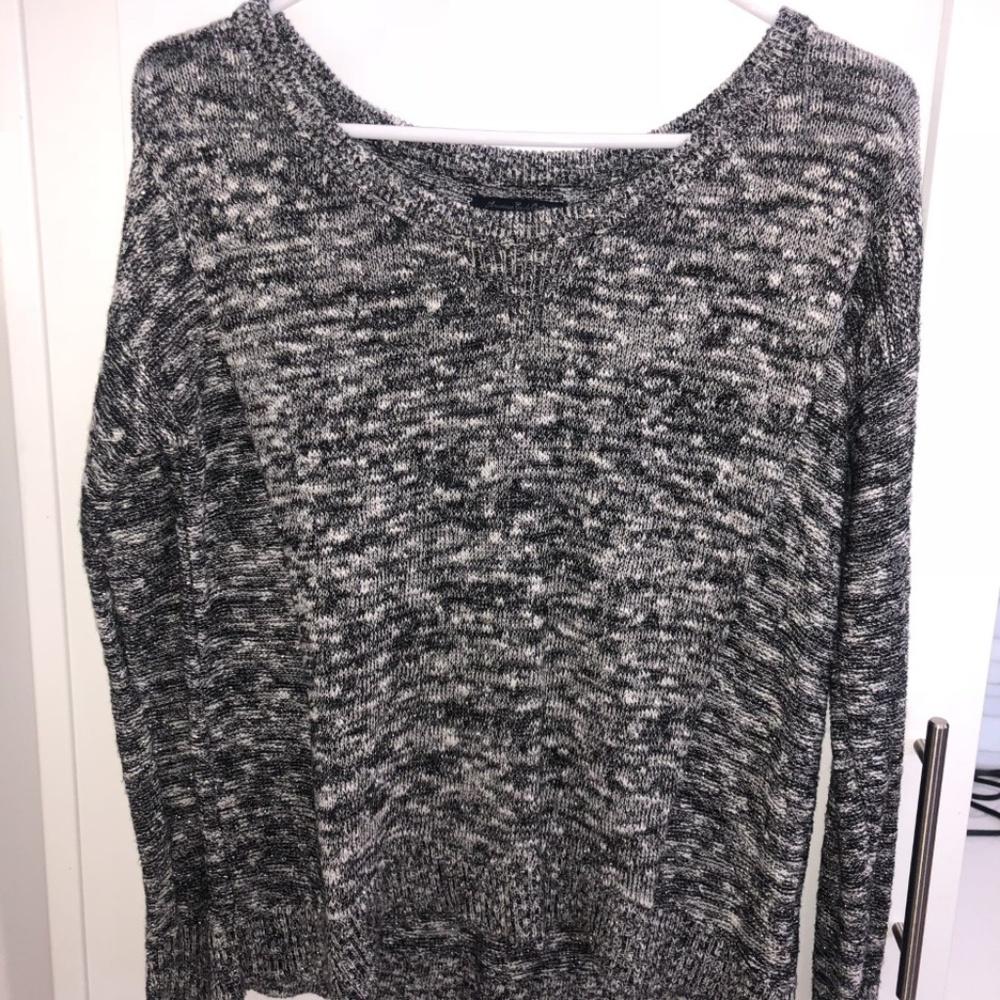 Gray, black and white sweater